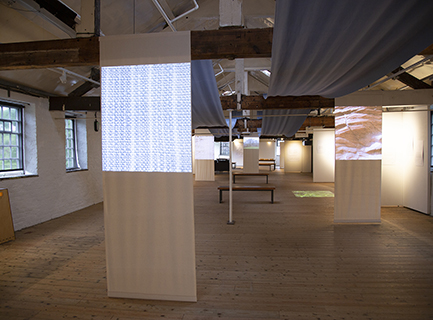 Installation of projections in an old mill building with wooden floors